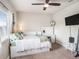 Bedroom with a view, a built in bed and vanity, and a mounted television at 6617 Park Strand Dr, Apollo Beach, FL 33572