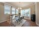Bright dining room with modern chandelier and lots of natural light at 6617 Park Strand Dr, Apollo Beach, FL 33572