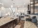 Kitchen featuring stainless appliances, island, and pendant lighting at 6617 Park Strand Dr, Apollo Beach, FL 33572