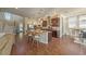 Spacious kitchen features a large island with seating and granite countertops at 6617 Park Strand Dr, Apollo Beach, FL 33572