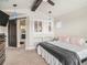 Stylish main bedroom showcasing a barn door entry and accent lighting at 6617 Park Strand Dr, Apollo Beach, FL 33572