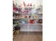 Well-stocked pantry with wire shelving, providing ample storage space for food and household items at 6644 Par Ct, Wesley Chapel, FL 33544