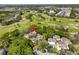 Aerial view of the property showcasing the golf course community and surrounding greenery at 700 Starkey Rd # 514, Largo, FL 33771