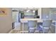 Eat in kitchen features stainless appliances and breakfast bar seating for two at 700 Starkey Rd # 514, Largo, FL 33771