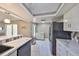 Bright kitchen with stainless steel appliances, marble countertops, and tile flooring at 700 Starkey Rd # 514, Largo, FL 33771