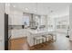 Modern kitchen featuring a large island, white cabinets, and stainless steel appliances at 8100 25Th N Ave, St Petersburg, FL 33710