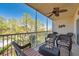 Relaxing screened balcony with comfortable seating and a beautiful view at 960 Starkey Rd # 5303, Largo, FL 33771