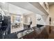Bright kitchen featuring white cabinets, stainless steel appliances, and granite countertops at 960 Starkey Rd # 5303, Largo, FL 33771