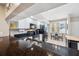 Bright kitchen featuring white cabinets, stainless steel appliances, and granite countertops at 960 Starkey Rd # 5303, Largo, FL 33771