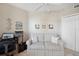 Comfortable living room with a sleeper sofa, fan, and stylish coastal decor at 960 Starkey Rd # 5303, Largo, FL 33771