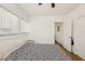 Simple bedroom with hardwood floors, a window, and ample space, perfect for relaxing at 1004 E 22Nd Ave, Tampa, FL 33605