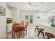 An elegant dining area boasting modern pendant lighting and stylish countertops and an open floorplan at 1004 E 22Nd Ave, Tampa, FL 33605