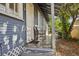 Cozy porch with seating, showcasing the home's inviting outdoor space at 1004 E 22Nd Ave, Tampa, FL 33605
