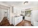Bright kitchen with white cabinets, updated countertops, and stainless appliances at 15165 Waverly St, Clearwater, FL 33760