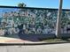 Dogedin mural in the city of Dunedin with many dogs at 1567 Patton Dr, Dunedin, FL 34698
