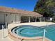Relaxing community hot tub with an attached pool, perfect for soaking and unwinding at 1567 Patton Dr, Dunedin, FL 34698