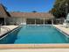 Sparkling community pool with a 6-foot depth, perfect for swimming laps or relaxing by the water at 1567 Patton Dr, Dunedin, FL 34698