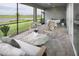 Inviting screened patio with views of the lake and golf course, perfect for relaxing outdoors at 18264 Chromata Dr, Venice, FL 34293