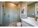 Modern bathroom featuring tiled shower, quartz countertops, designer fixtures, and a contemporary design at 18604 Arbor Vista Dr, Venice, FL 34293