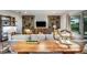 Cozy living room with stylish decor, featuring comfortable seating and natural light at 18604 Arbor Vista Dr, Venice, FL 34293