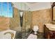 Bathroom with glass enclosed shower, soaking tub and custom double vanity at 2308 W Jetton Ave, Tampa, FL 33629