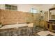 Stunning bathroom featuring a standalone tub and frameless glass shower at 2308 W Jetton Ave, Tampa, FL 33629