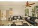 Comfortable living room features neutral walls, windows, and tile flooring at 2308 W Jetton Ave, Tampa, FL 33629