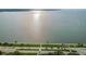 Scenic aerial view of the waterfront featuring clear waters and a paved shoreline at 2308 W Jetton Ave, Tampa, FL 33629