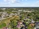 Extensive aerial view of a large residential neighborhood with open green spaces, tree-lined streets, and blue skies at 2309 Valrico Forest Dr, Valrico, FL 33594