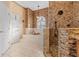 Beautiful bathroom featuring a tiled shower, large tub, and updated fixtures at 2309 Valrico Forest Dr, Valrico, FL 33594