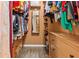 Organized walk-in closet featuring custom shelving and ample storage space at 2309 Valrico Forest Dr, Valrico, FL 33594