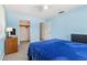 Light and airy bedroom with a ceiling fan, closet, and lots of natural light at 2646 Barksdale Ct, Clearwater, FL 33761
