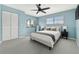 Bedroom featuring a ceiling fan, closet, and lots of natural light at 2646 Barksdale Ct, Clearwater, FL 33761