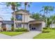 Charming townhome with well-maintained lawn and landscaping, neutral toned stucco and room for parking at 2646 Barksdale Ct, Clearwater, FL 33761