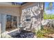 Cozy patio area with a table and chairs, perfect for relaxing outdoors at 2646 Barksdale Ct, Clearwater, FL 33761