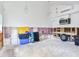 A garage featuring appliances, storage containers, and a tire at 2827 W Bay Haven Dr, Tampa, FL 33611