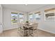 Cozy dining area with natural light and seating for six at 28889 Orange Berry # Dr, Wesley Chapel, FL 33543
