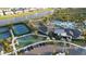 Aerial view of community amenities including tennis courts, basketball court and pool at 33410 Castaway Loop, Wesley Chapel, FL 33543