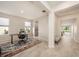 Home office features wood-look tile floors, neutral paint, and lots of natural light at 33410 Castaway Loop, Wesley Chapel, FL 33543