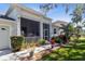 Inviting front porch featuring comfortable seating and decorative plants, creating a cozy entrance at 3629 Mossy Oak Cir, Land O Lakes, FL 34639