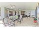 Expansive screened-in porch offering ample seating and dining areas for entertaining and relaxation at 3629 Mossy Oak Cir, Land O Lakes, FL 34639