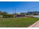 East Lake Woodlands community sign with manicured landscaping at 370 S Woodlands Dr, Oldsmar, FL 34677