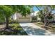 Charming single-Gathering home with a two-car garage and well-manicured lawn at 370 S Woodlands Dr, Oldsmar, FL 34677