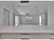 Bright living room showcasing a view to the sliding glass door and marble countertops at 370 S Woodlands Dr, Oldsmar, FL 34677