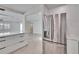 Open living space featuring view of stainless fridge and kitchen island at 370 S Woodlands Dr, Oldsmar, FL 34677