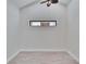 Room featuring a small window, wood look floors and neutral walls at 370 S Woodlands Dr, Oldsmar, FL 34677