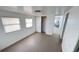 Bright bedroom with two windows and ample closet space at 4851 W Gandy Blvd # B1L14, Tampa, FL 33611