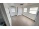 Spacious bedroom with two windows and a large closet at 4851 W Gandy Blvd # B1L14, Tampa, FL 33611