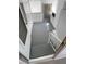 View of the utility area with washer, dryer, storage and staircase at 4851 W Gandy Blvd # B1L14, Tampa, FL 33611