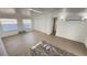 Bright, open living room featuring new flooring and modern fixtures at 4851 W Gandy Blvd # B1L14, Tampa, FL 33611
